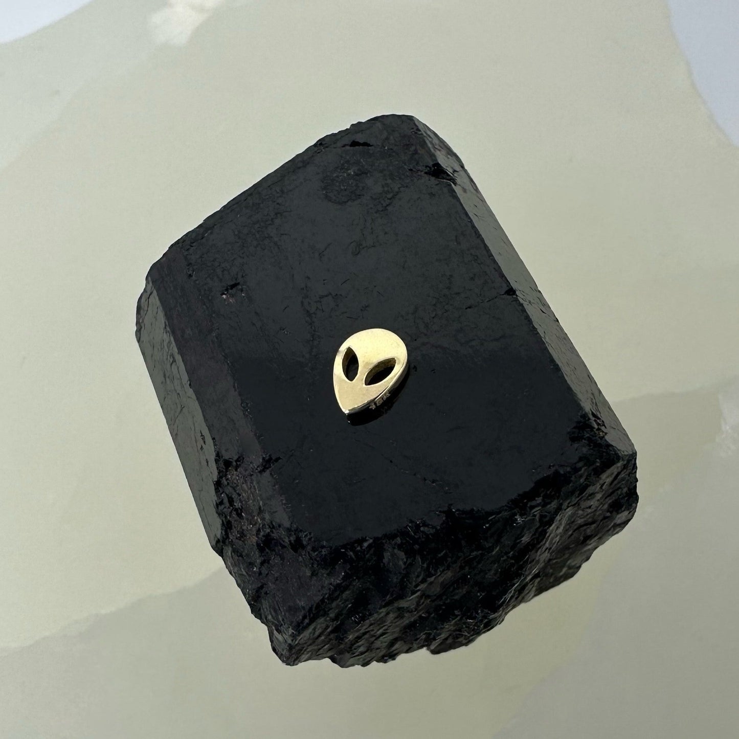 Gold Alien Tooth Gem